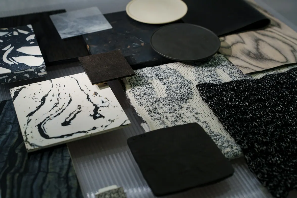 Textile procurement moodboard with fabric samples and specification notes