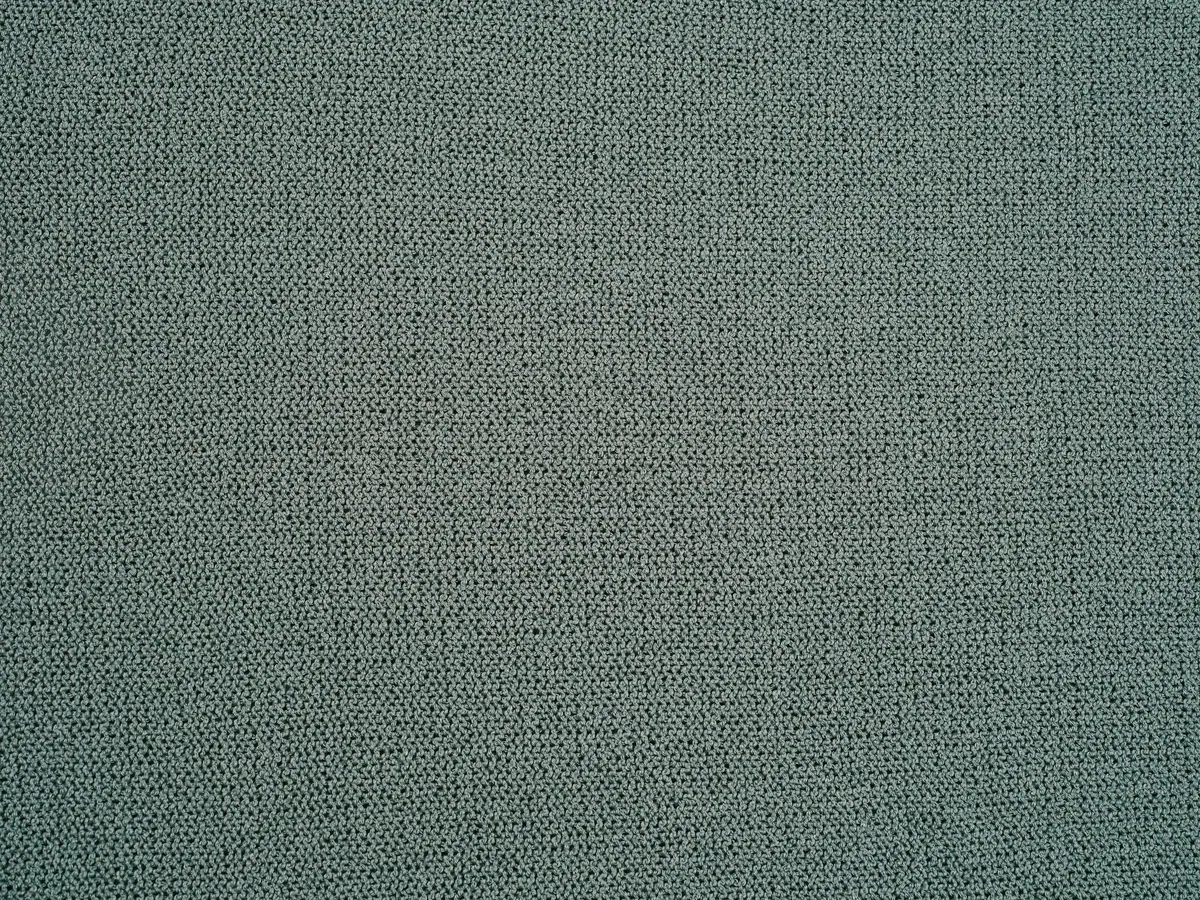 Upholstery fabric texture close-up showing durable woven surface